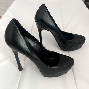 Black leather heel with platform.